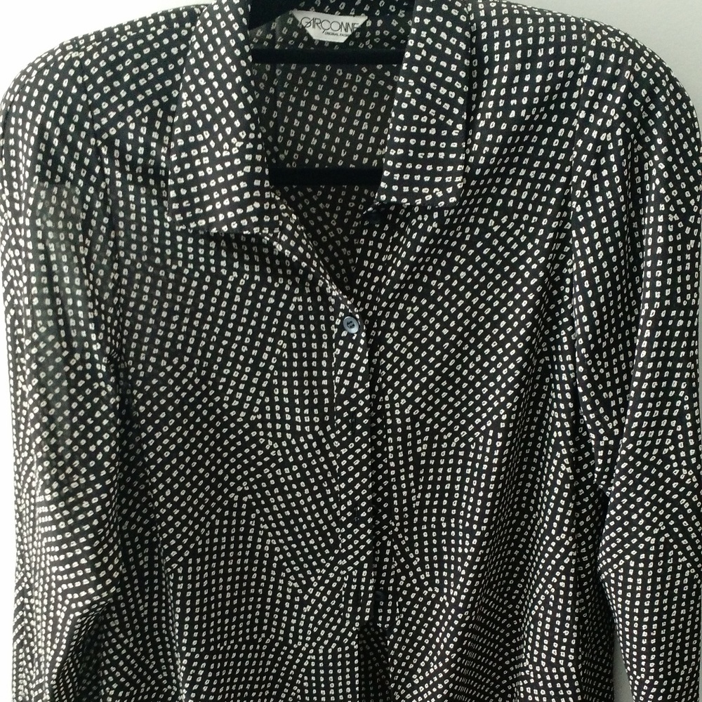 Black and cream button down blouse.